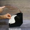 Mở nắp hộp bảo quản và lấy giấy một cách dễ dàng